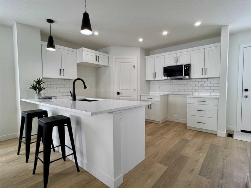 8570 72 Avenue, Grande Prairie, AB - Indoor Photo Showing Kitchen With Upgraded Kitchen
