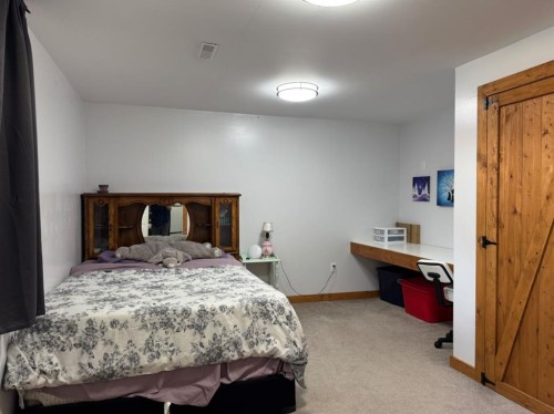 11721 103 Avenue, Fairview, AB - Indoor Photo Showing Bedroom