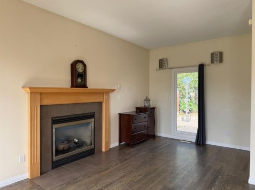 11721 103 Avenue, Fairview, AB - Indoor Photo Showing Living Room With Fireplace