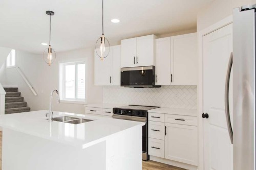 11405 95 Street, Clairmont, AB - Indoor Photo Showing Kitchen With Double Sink With Upgraded Kitchen