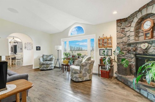 62064A Township Road 730, Clairmont, AB - Indoor Photo Showing Living Room With Fireplace