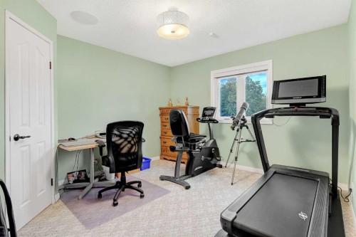 62064A Township Road 730, Clairmont, AB - Indoor Photo Showing Gym Room