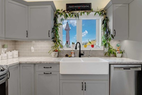 62064A Township Road 730, Clairmont, AB - Indoor Photo Showing Kitchen With Double Sink