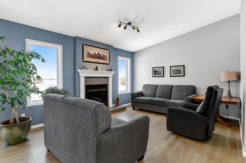 12-712074 Range Rd 55, Grande Prairie, AB - Indoor Photo Showing Living Room With Fireplace