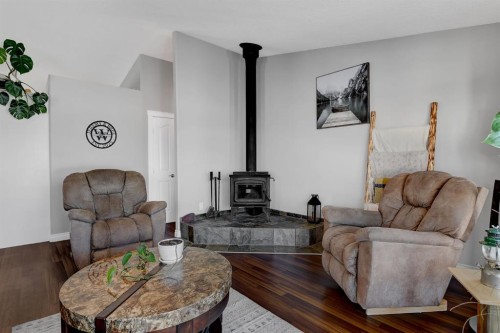 1419 Twp 724, Debolt, AB - Indoor Photo Showing Living Room With Fireplace