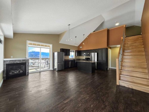 411-160 Moberly Road, Grande Cache, AB - Indoor Photo Showing Other Room With Fireplace
