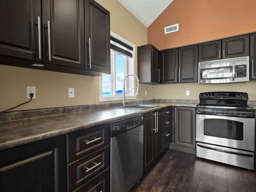 411-160 Moberly Road, Grande Cache, AB - Indoor Photo Showing Kitchen With Double Sink