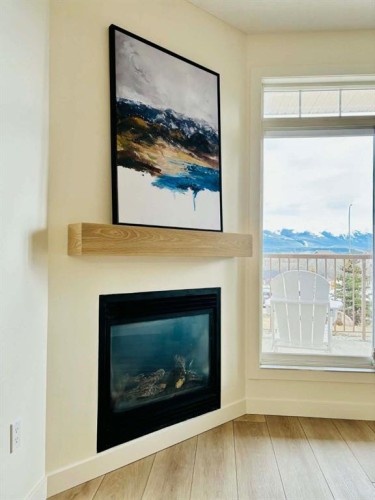 101-160 Moberly Road, Grande Cache, AB - Indoor Photo Showing Living Room With Fireplace