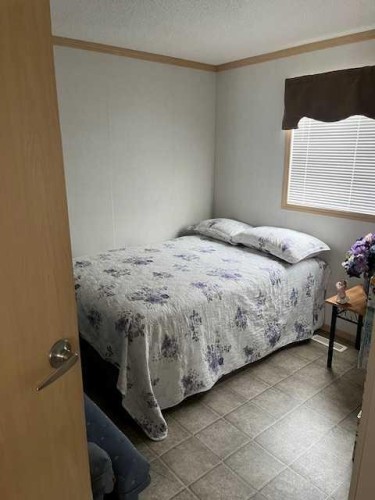 303 4Th Avenue Sw, Manning, AB - Indoor Photo Showing Bedroom