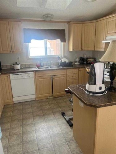 303 4Th Avenue Sw, Manning, AB - Indoor Photo Showing Kitchen With Double Sink