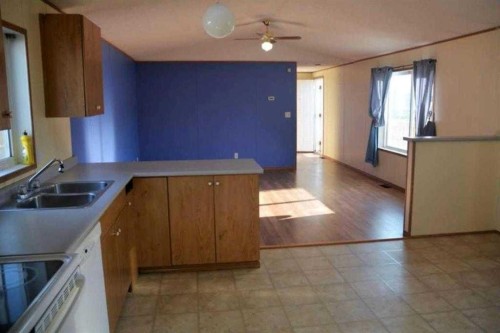 9718 108 Avenue, Clairmont, AB - Indoor Photo Showing Kitchen With Double Sink
