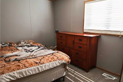 9718 108 Avenue, Clairmont, AB - Indoor Photo Showing Bedroom