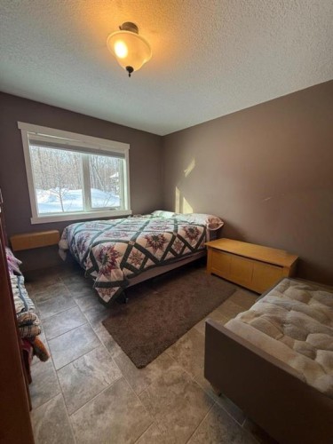 151 Peace River Avenue, Joussard, AB - Indoor Photo Showing Bedroom