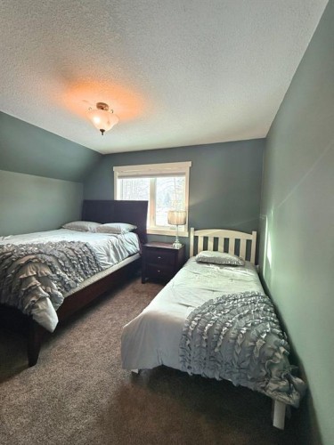 151 Peace River Avenue, Joussard, AB - Indoor Photo Showing Bedroom