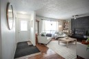 10403 106 Avenue, High Level, AB  - Indoor Photo Showing Living Room With Fireplace 