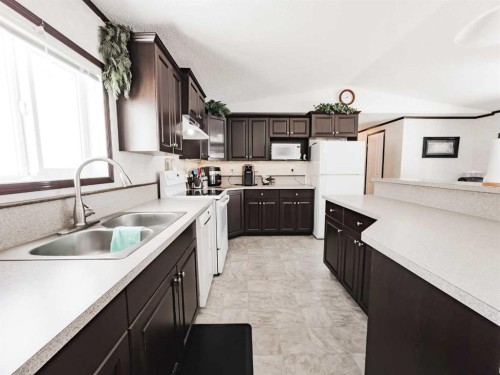 893029 Range Rd 232, Manning, AB - Indoor Photo Showing Kitchen With Double Sink