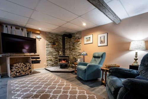 8 Grenier Ave, St. Isidore, AB - Indoor With Fireplace