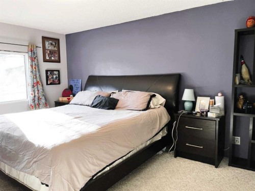 4521 50 Avenue, Grimshaw, AB - Indoor Photo Showing Bedroom