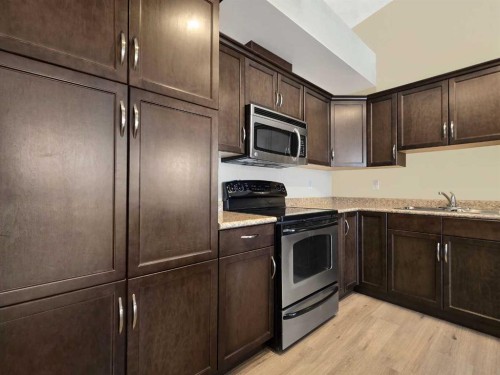 414-160 Moberly Road, Grande Cache, AB - Indoor Photo Showing Kitchen With Double Sink