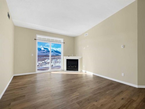 414-160 Moberly Road, Grande Cache, AB - Indoor Photo Showing Living Room With Fireplace