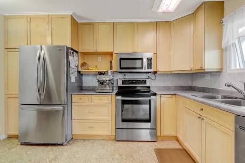 11304 108 Avenue, Fairview, AB - Indoor Photo Showing Kitchen With Stainless Steel Kitchen With Double Sink