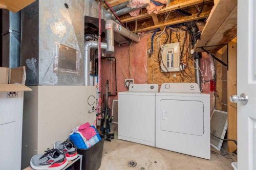 85 Pinnacle Crossing, Grande Prairie, AB - Indoor Photo Showing Laundry Room
