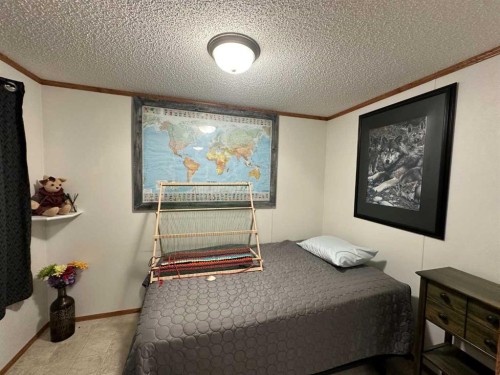 452 1St Street Sw, Falher, AB - Indoor Photo Showing Bedroom