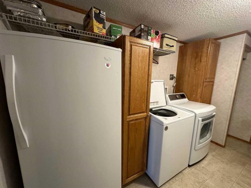 452 1St Street Sw, Falher, AB - Indoor Photo Showing Laundry Room