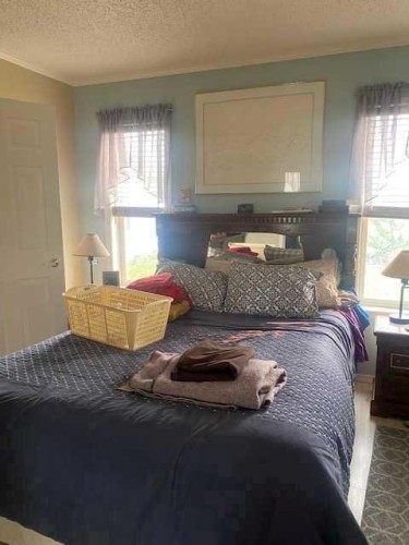 70104 230 Range Road, Valleyview, AB - Indoor Photo Showing Bedroom