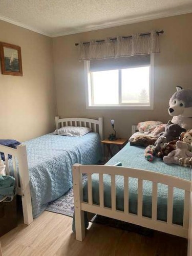70104 230 Range Road, Valleyview, AB - Indoor Photo Showing Bedroom