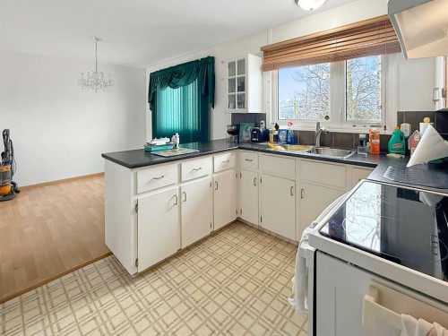 10650 104Th Avenue, Grande Cache, AB - Indoor Photo Showing Kitchen With Double Sink