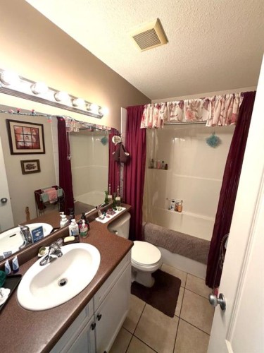 8821 Lakeland Drive, Grande Prairie, AB - Indoor Photo Showing Bedroom