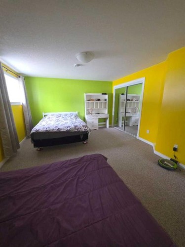 #10-1St Avenue Key Cove Estates, Joussard, AB - Indoor Photo Showing Bedroom