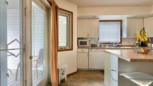 10302 83 Street, Peace River, AB - Indoor Photo Showing Kitchen With Double Sink