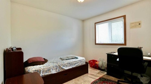 10302 83 Street, Peace River, AB - Indoor Photo Showing Bedroom