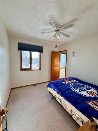 9202 95 Ave, La Crete, AB - Indoor Photo Showing Bedroom