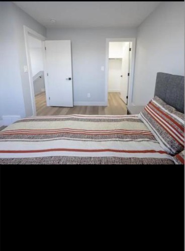 9313 103 Avenue, Grande Prairie, AB - Indoor Photo Showing Bedroom