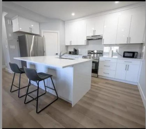 9313 103 Avenue, Grande Prairie, AB - Indoor Photo Showing Kitchen With Upgraded Kitchen