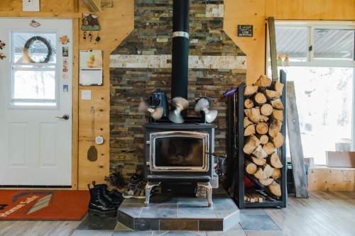 7923 Range Road 73, Rural Saddle Hills County, AB - Indoor Photo Showing Other Room With Fireplace