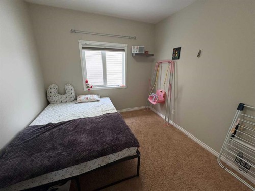 9117 134 Avenue, Peace River, AB - Indoor Photo Showing Bedroom