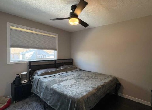 8322 101 Avenue, Peace River, AB - Indoor Photo Showing Bedroom