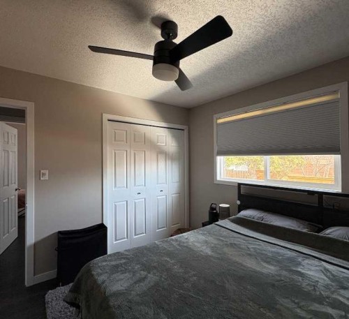 8322 101 Avenue, Peace River, AB - Indoor Photo Showing Bedroom