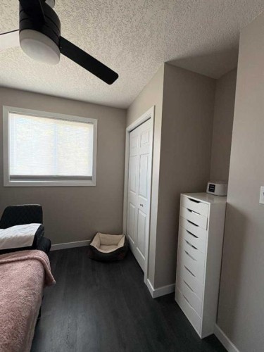 8322 101 Avenue, Peace River, AB - Indoor Photo Showing Bedroom
