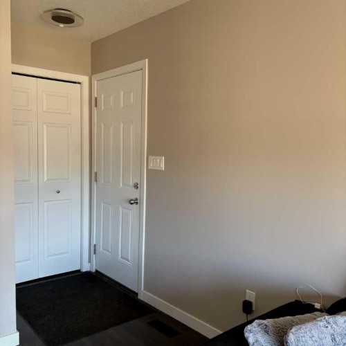 8322 101 Avenue, Peace River, AB - Indoor Photo Showing Bedroom