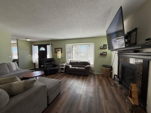 74420 Range Road 172, High Prairie, AB - Indoor Photo Showing Living Room With Fireplace