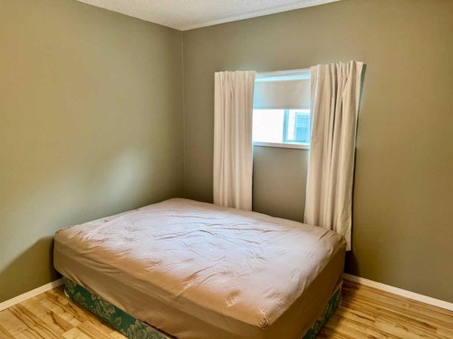 107 Central Avenue S.W., Falher, AB - Indoor Photo Showing Bedroom