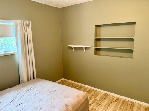 107 Central Avenue S.W., Falher, AB - Indoor Photo Showing Bedroom