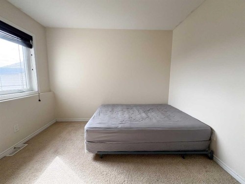 9510 Willow Drive, Grande Prairie, AB - Indoor Photo Showing Bedroom