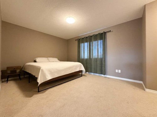 9510 Willow Drive, Grande Prairie, AB - Indoor Photo Showing Bedroom