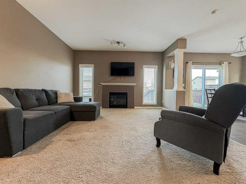 9510 Willow Drive, Grande Prairie, AB - Indoor Photo Showing Living Room With Fireplace
